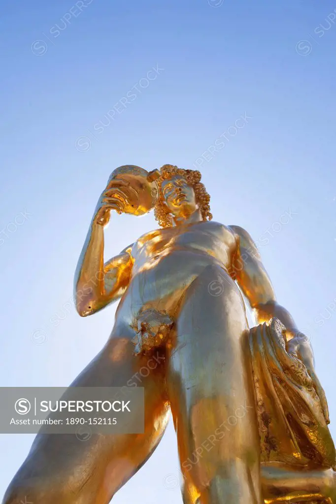 Golden statue on the Grand Cascade at Peterhof Palace, St. Petersburg, Russia, Europe
