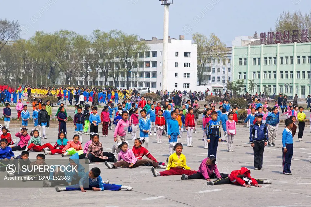 Children practising mass games outside the Grand Theatre, Hamhung, Democratic People´s Republic of Korea DPRK, North Korea, Asia