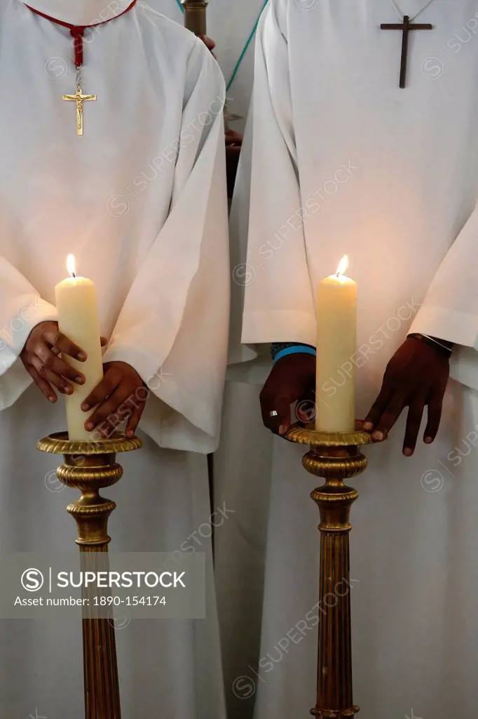 Catholic altar boys holding church candles, Seine_Saint_Denis, France, Europe