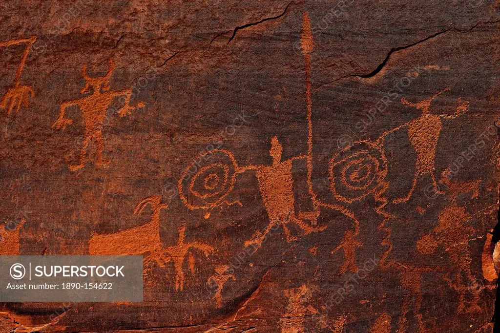 Horned anthropomorphs holding shields, Formative Period Petroglyphs, Utah Scenic Byway 279, Potash Road, Moab, Utah, United States of America, North A...