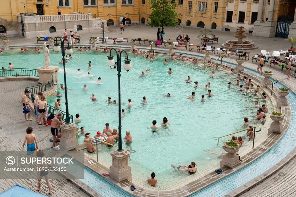 Outdoor pool with men and women at Szechenyi Thermal Baths, Budapest, Hungary, Europe