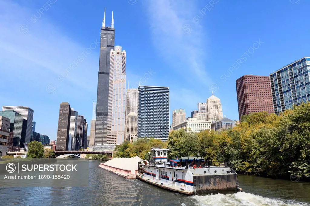 River traffic on the south branch of the Chicago River, Willis Tower, formerly the Sears Tower dominates the skyline, Chicago, Illinois, United States...