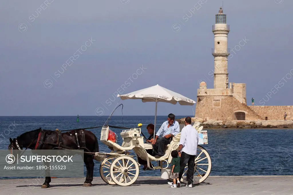 A horse and cart for city tours, at the Venetian era harbour, at the Mediterranean port of Chania Canea, Crete, Greek Islands, Greece, Europe