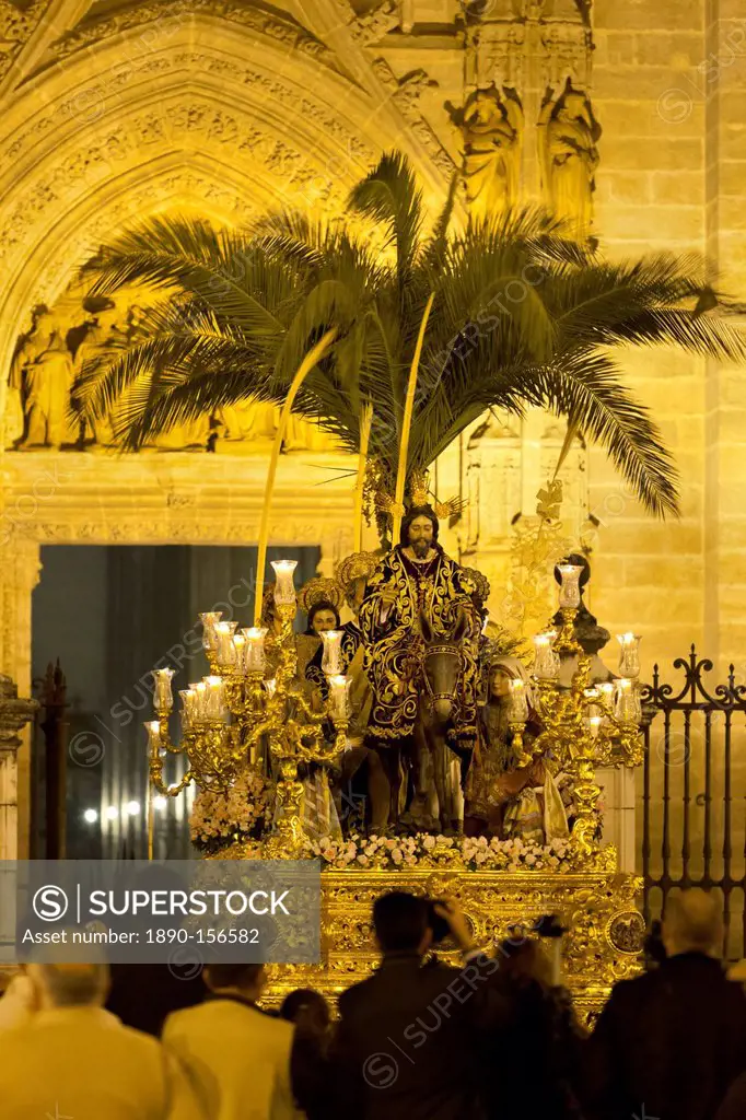 Semana Santa (Holy Week) float with image of Christ outside Seville cathedral, Seville, Andalucia, Spain, Europe