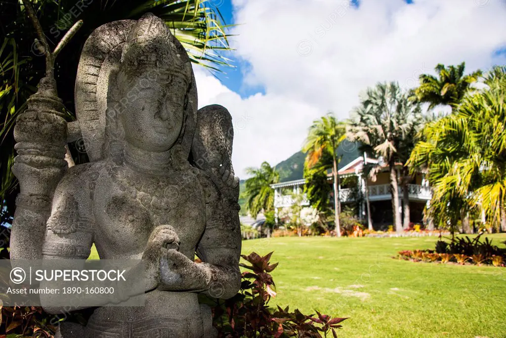 Buddhist statues in the Botanical Gardens on Nevis Island, St. Kitts and Nevis, Leeward Islands, West Indies, Caribbean, Central America