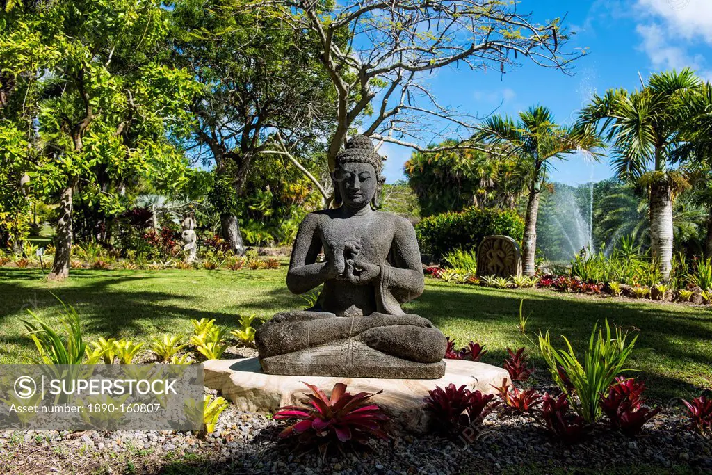 Buddhist statues in the Botanical gardens in Nevis island, St. Kitts and Nevis, Caribbean
