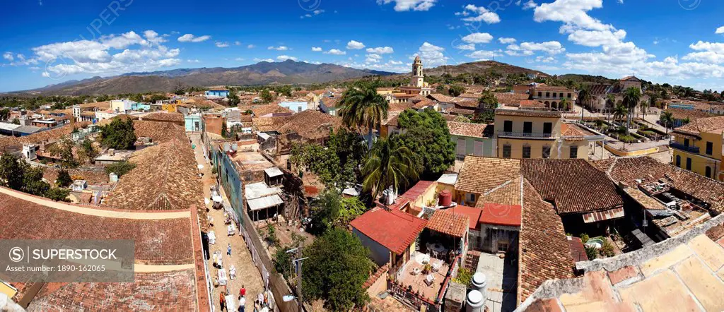 Panoramic view over the pantiled rooftops and cobbled streets of the town towards the belltower of The Convento de San Francisco de Asis, Trinidad, UN...