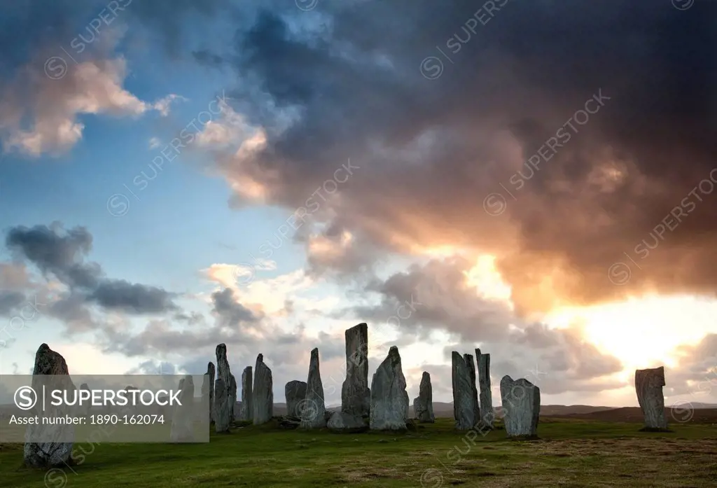 Standing Stones of Callanish at sunset with dramatic sky in the background, near Carloway, Isle of Lewis, Outer Hebrides, Scotland, United Kingdom, Eu...
