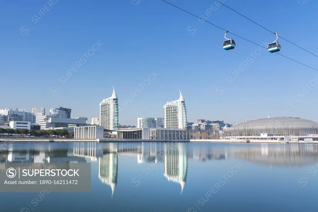 Reflection of Pavilhao de Portugal, Expo 98, with cable car, in Parque das Nacoes (Park of the Nations), Lisbon, Portugal, Europe