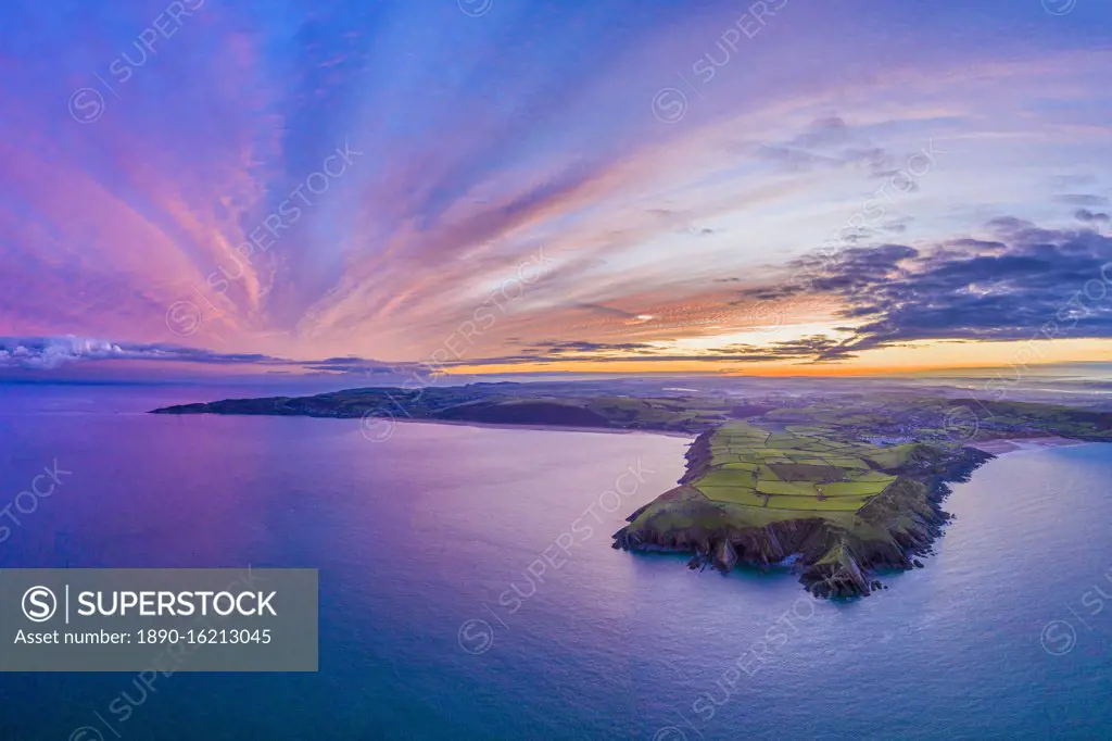 Aerial sunrise view over Baggy Point towards Woolacombe, Morte Bay, North Devon, England, United Kingdom, Europe