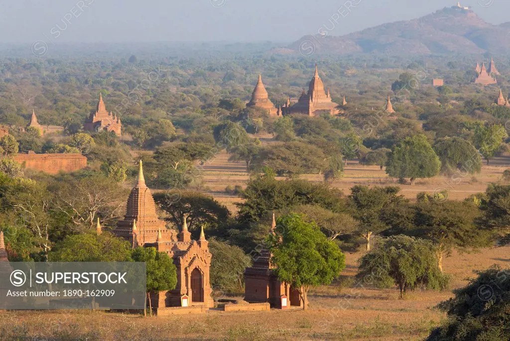 View over the temples of Bagan bathed in evening sunlight, from Shwesandaw Paya, Bagan, Myanmar (Burma), Southeast Asia