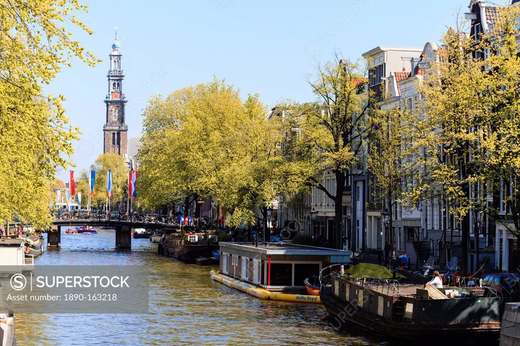 Westerkerk church tower by Prinsengracht canal, Amsterdam, Netherlands, Europe
