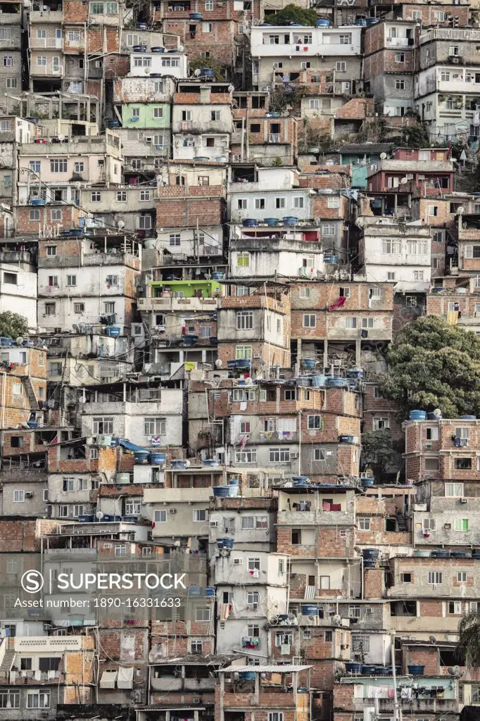 View of poor housing in the favela (slum), Cantagalo near Copacabana Beach, Rio de Janeiro, Brazil, South America