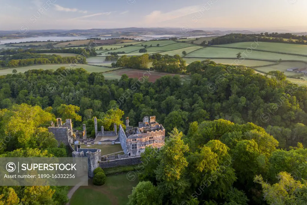 Aerial photograph of Berry Pomeroy Castle at dawn in spring, Devon, England, United Kingdom, Europe