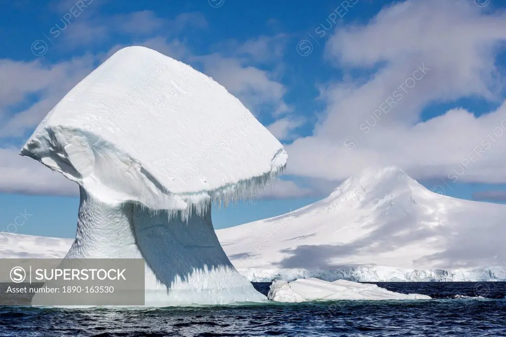 Huge mushroom shaped iceberg in Dorian Bay, western side of the Antarctic Peninsula, Southern Ocean, Polar Regions