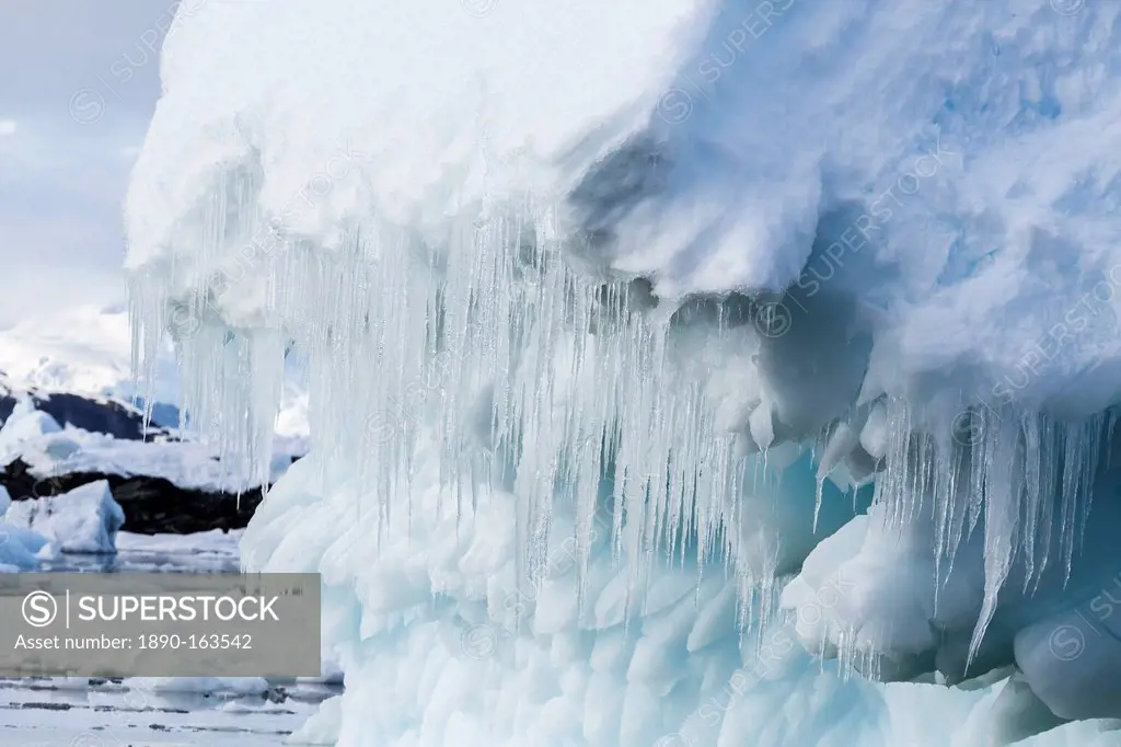 Icicles hanging from iceberg in the Yalour Islands, western side of the Antarctic Peninsula, Southern Ocean, Polar Regions