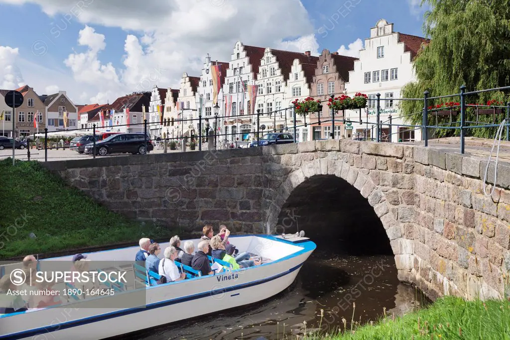 Excursion boat on a canal, Friedrichstadt, Schleswig Holstein, Germany, Europe