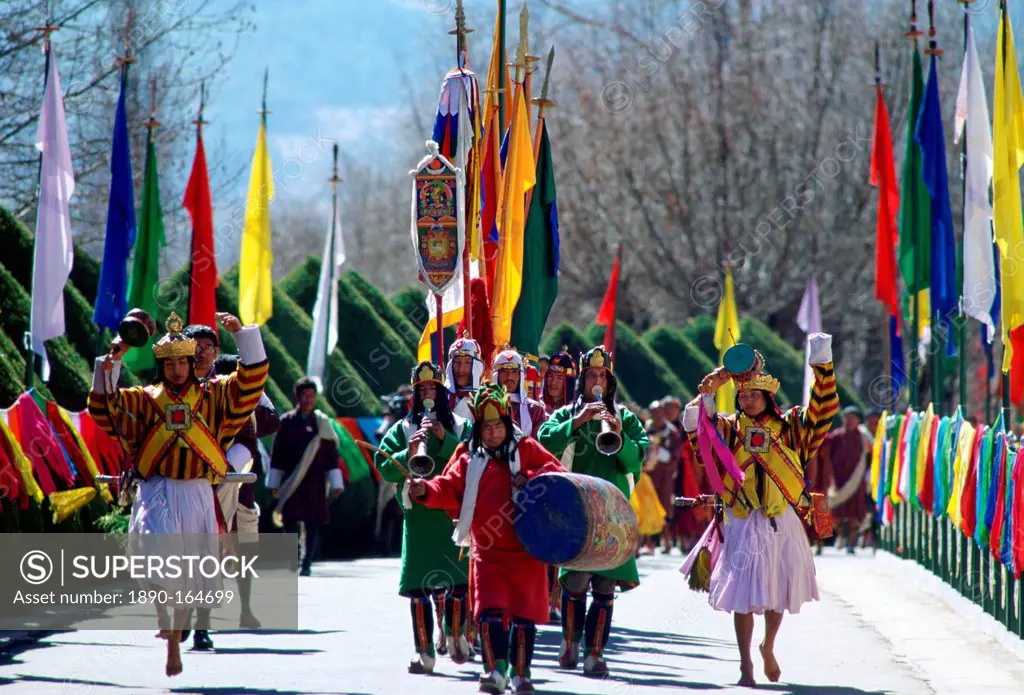 Musicians lead royal procession to King's palace, Tashichho Dzong, Thimpu, Bhutan