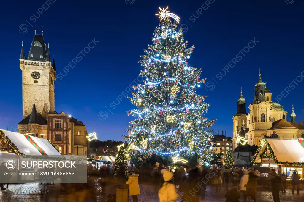 Christmas Market, Christmas tree, Gothic Town Hall and Baroque St. Nicholas Church at Old Town Square, UNESCO World Heritage Site, Old Town, Prague, Czech Republic, Europe