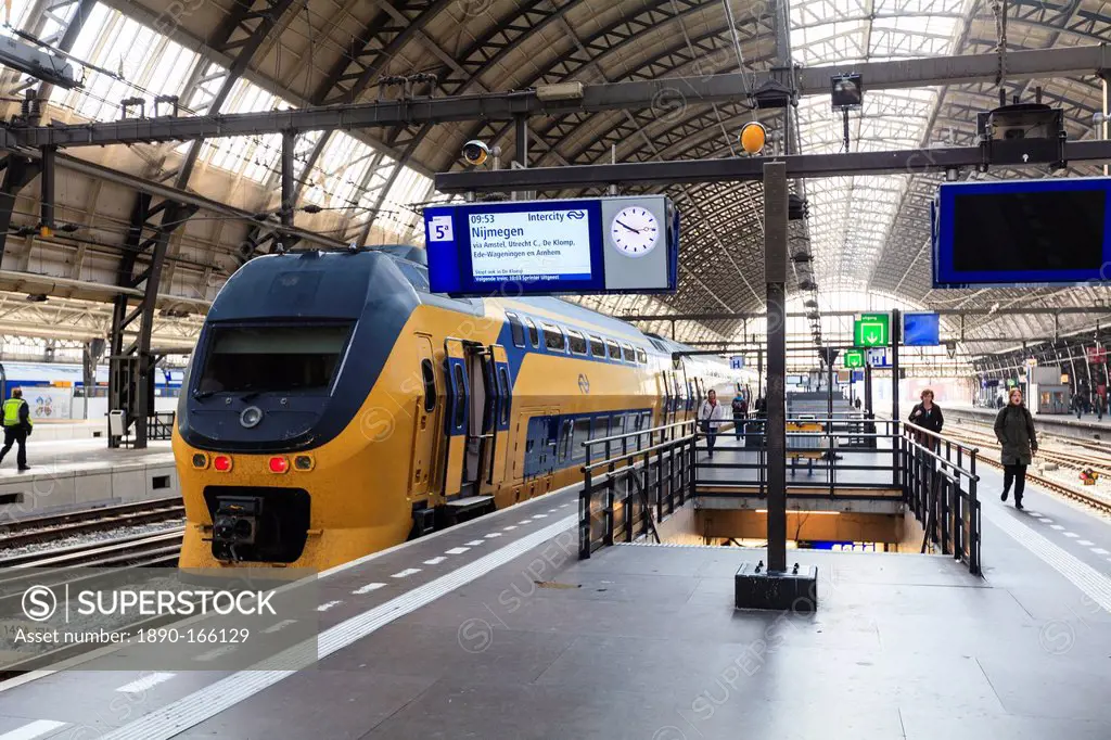 Intercity train in a platform at Central Station, Amsterdam, Netherlands, Europe