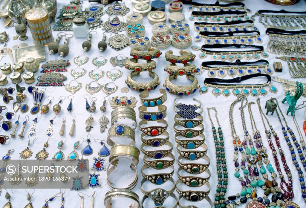 Silver jewels - necklaces, bangles, bracelets, earrings, pendants with semi-precious stones - on display at a market in Pakistan