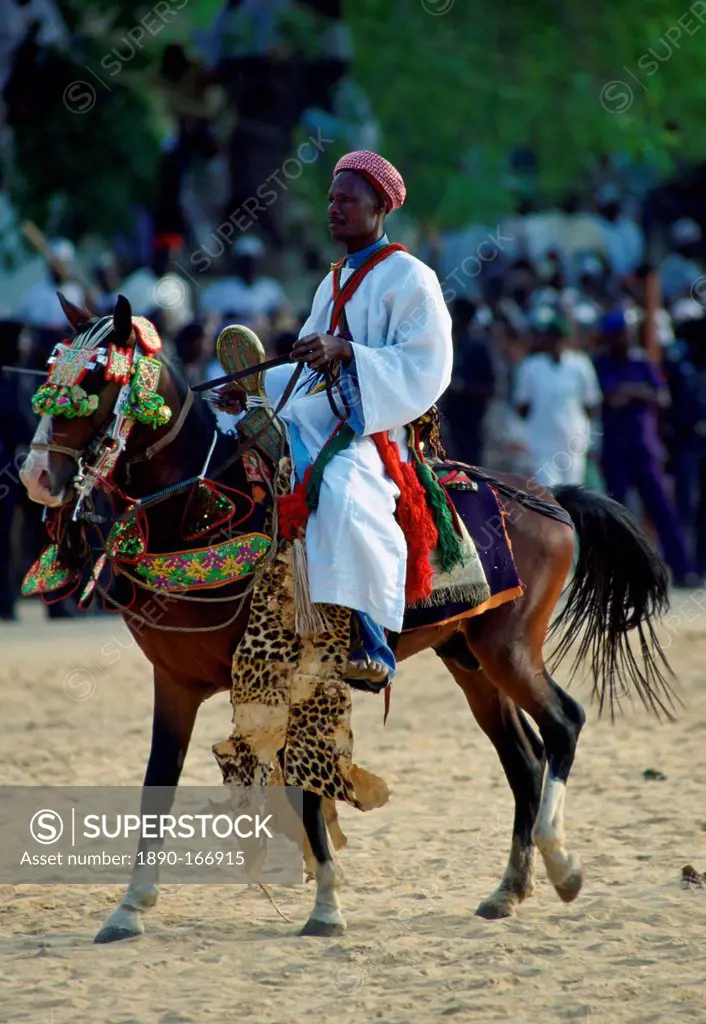 Man riding a decorated horse during a Durbar in Maiduguri, Nigeria