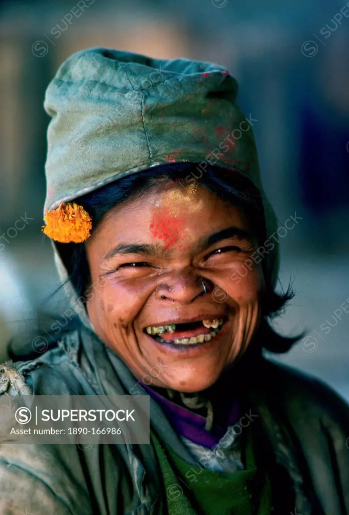A holy woman laughing at Pashupatinath Hindu Temple in Nepal
