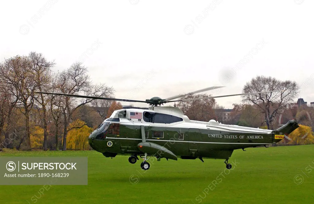President George W Bush with his wife Laura leaving by helicopter after his official visit to Britain