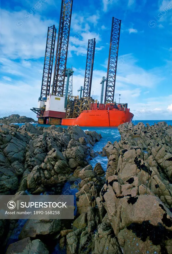 Oil rig aground in Grandes Rocques Bay, Guernsey, Channel Islands