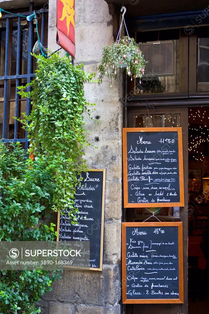 French menus outside cafe restaurant in Bordeaux, France.