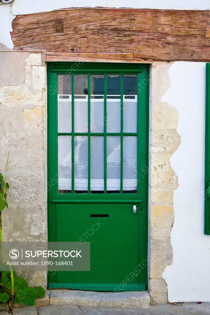 Door with net panel, Ile De Re, France.