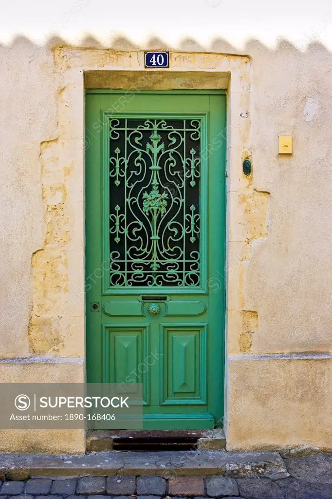 Traditional door with metal design, Ile De Re, France.