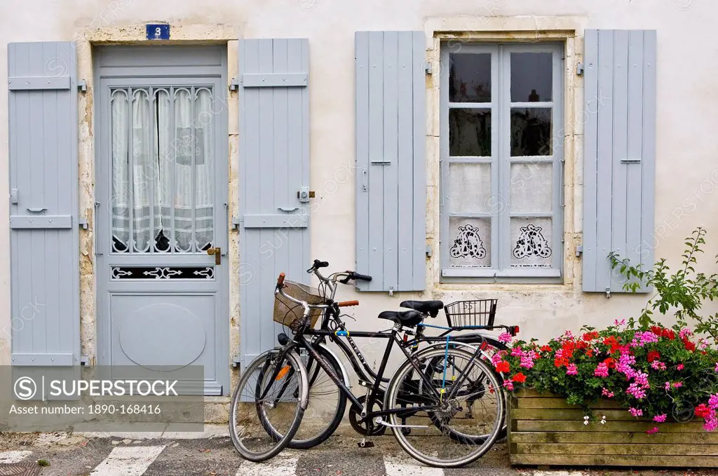 Traditional home with bicycles, Ile De Re, France.
