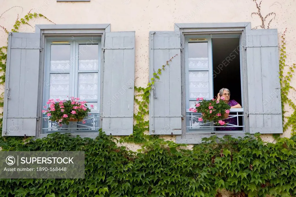 Woman at her window, Labastide d'Armagnac, France