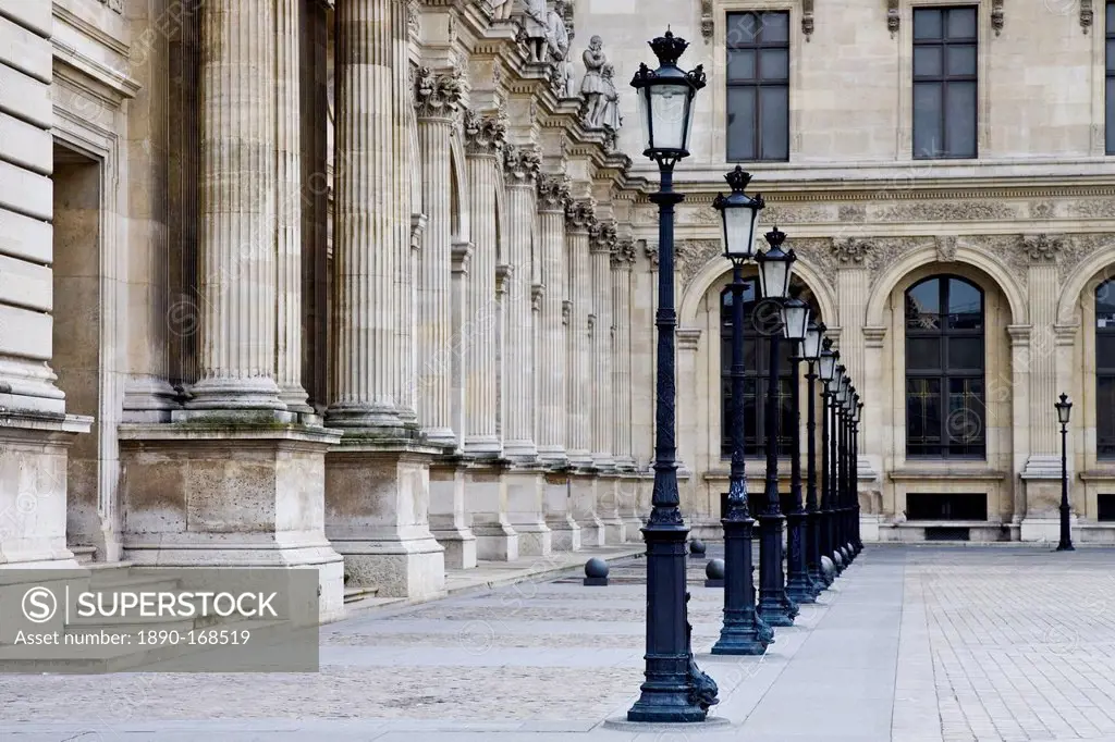 Row of street lights by Louvre Museum, Paris, France