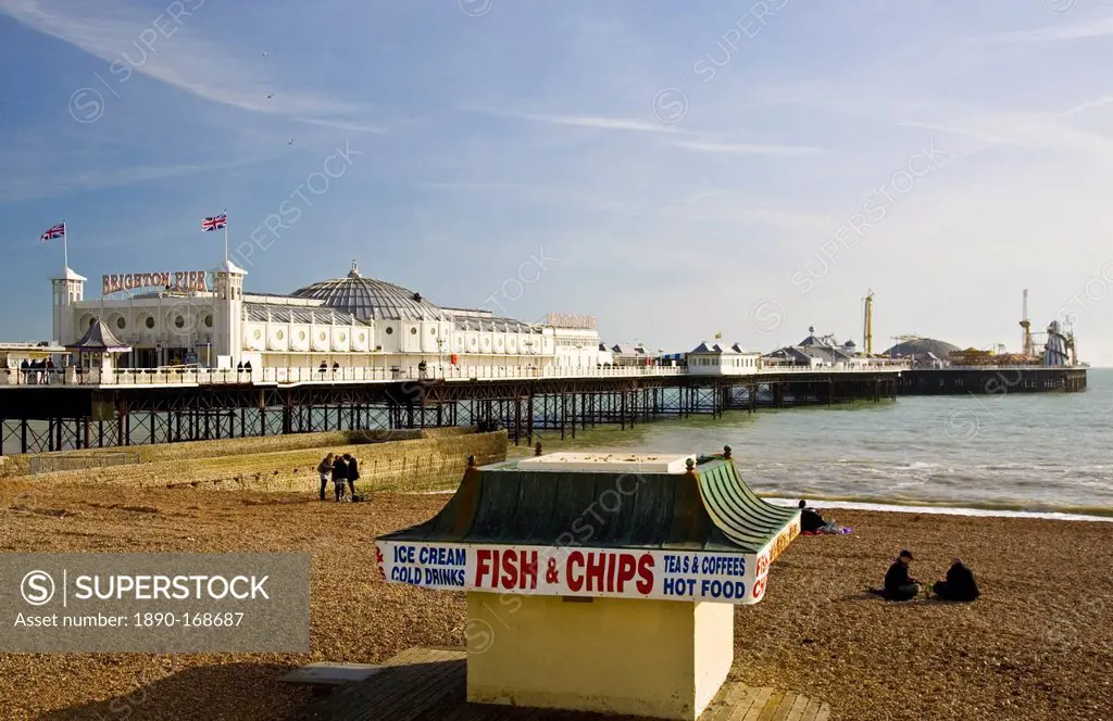 Fish and chip shop on beach by Brighton Pier on the South Coast of England, United Kingdom