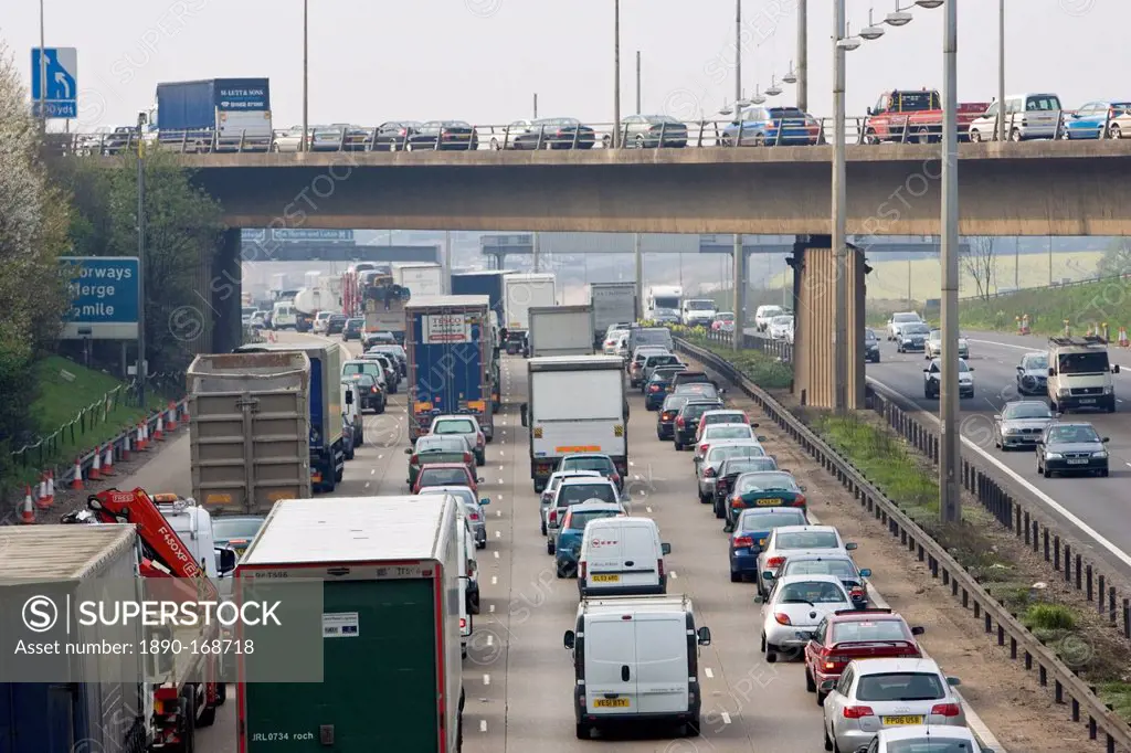 Heavy weight of traffic travelling on M1 motorway in Hertfordshire, United Kingdom
