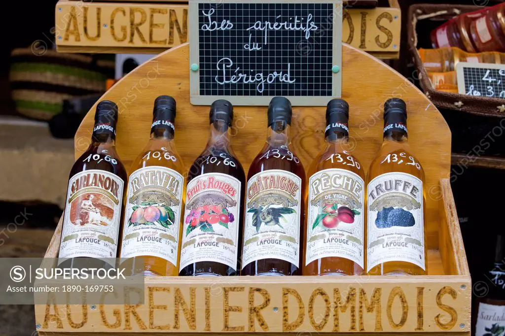 Les Aperitifs de Perigord, truffle, peach, red fruits flavor, on sale in market at Domme in the Dordogne, France