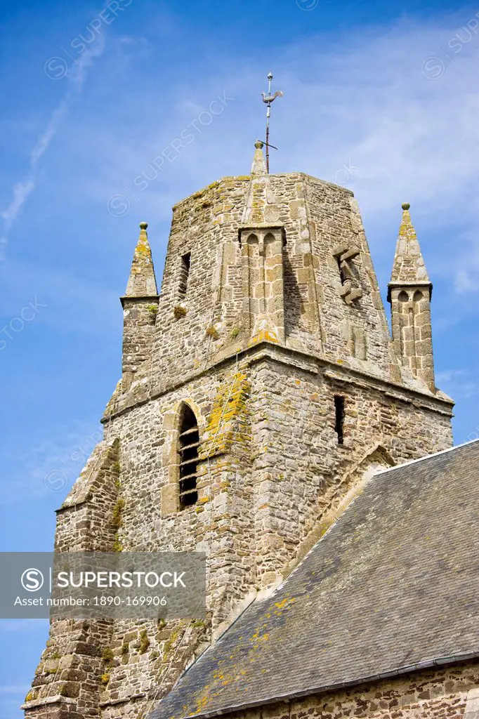 Norman church with unusual rounded square tower in Regneville-Sur-Mer in Normandy, France