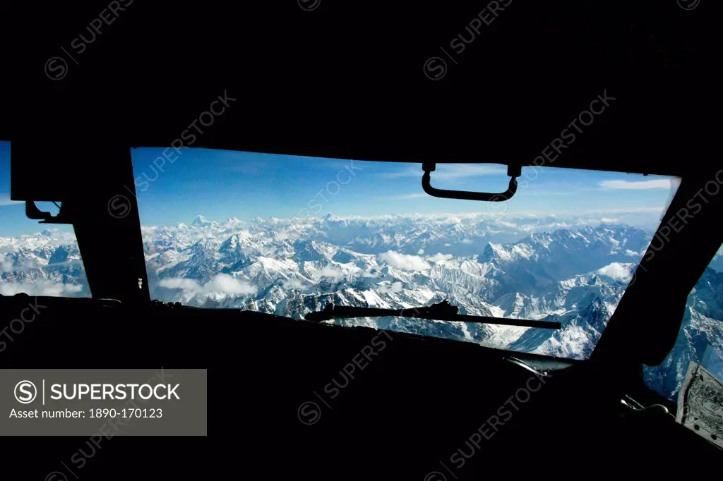 Karokoram mountains above Skardu Valley viewed from airplane cockpit in Northern Pakistan