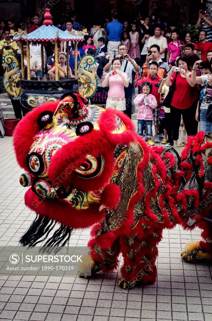 A traditional lion dance during Chinese New Year celebrations, Thean Hou Temple, Kuala Lumpur, Malaysia, Southeast Asia, Asia
