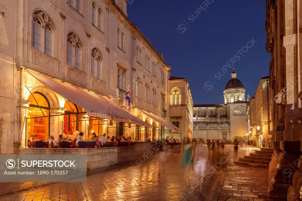 Pred Dvorom, lit up at dusk, cathedral in background, Dubrovnik, Croatia, Europe