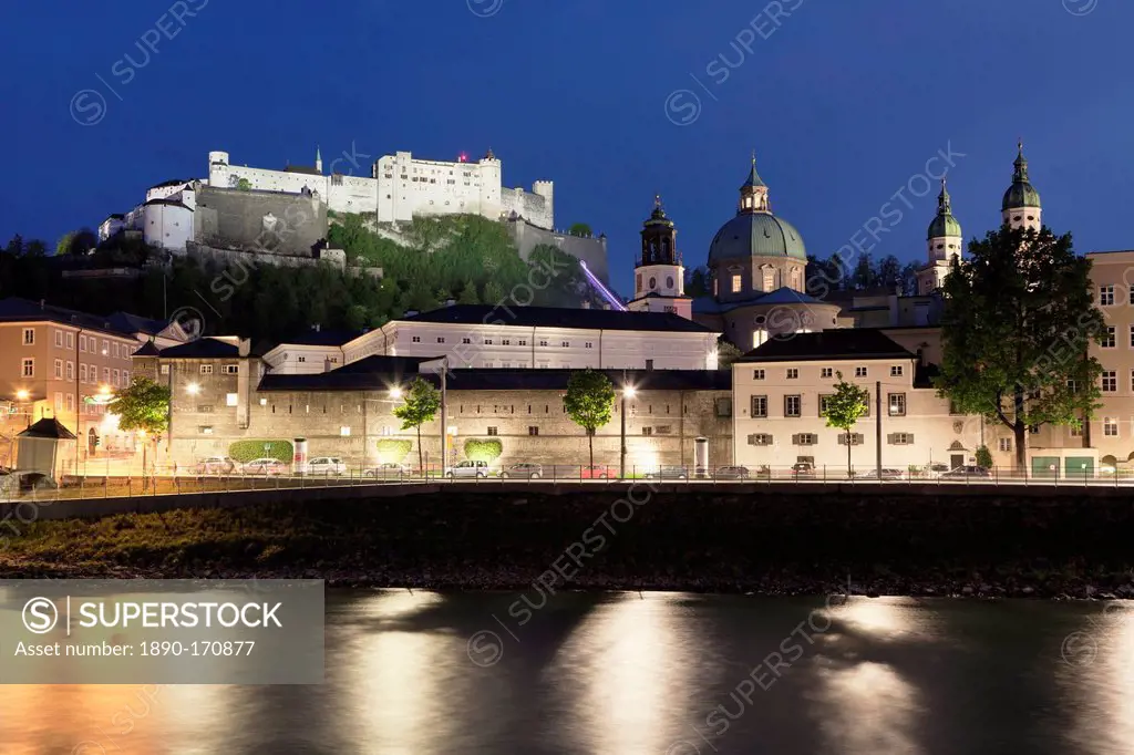 Old Town, UNESCO World Heritage Site, and Castle Hohensalzburg, Cathedral, Kollegienkirche church and the River Salzach at dusk, Salzburg, Salzburger ...