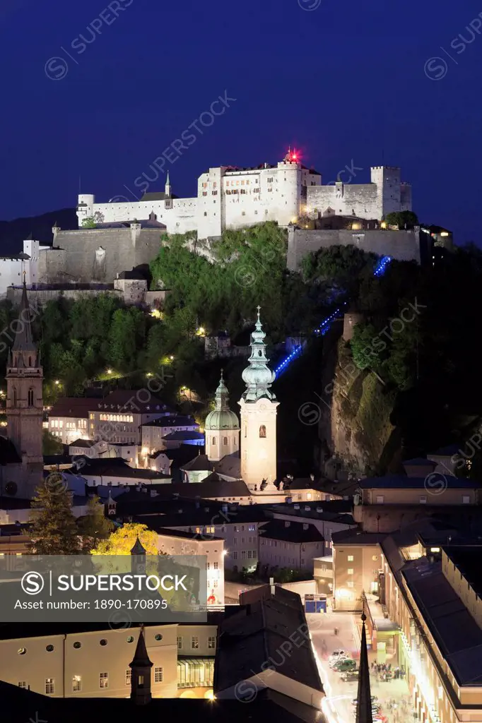 High angle view of the Old Town, UNESCO World Heritage Site, with Hohensalzburg Fortress and Dom Cathedral at dusk, Salzburg, Salzburger Land, Austria...