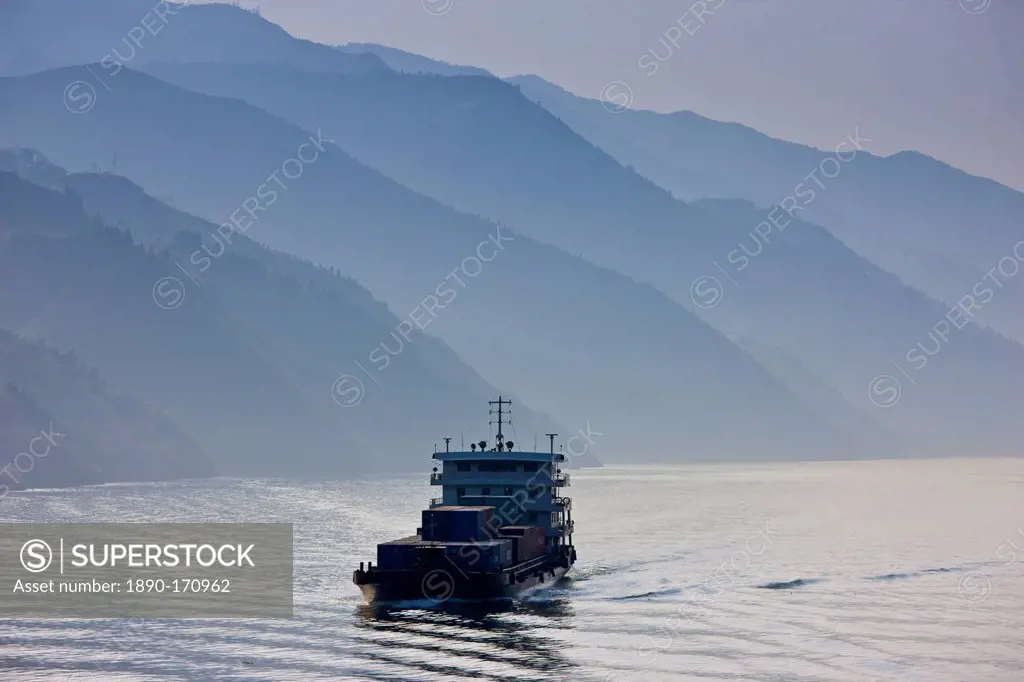 Transportation of cargo containers by boat in Three Gorges area, Yangtze River, China