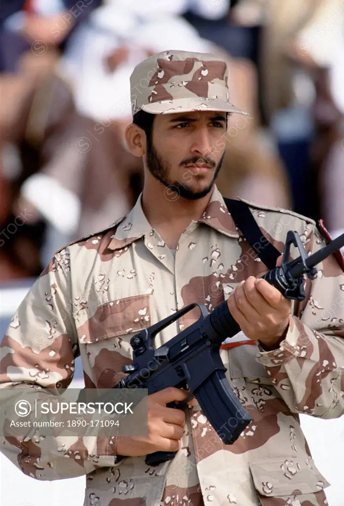 Armed solder in camouflage uniform in Abu Dhabi for celebration of 20th Anniversary of United Arab Emirates