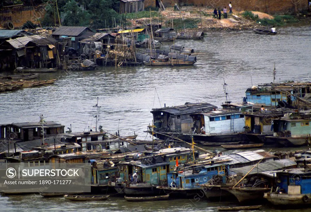 Houseboats and cargo boats on the Pearl River at Canton, China in the 1980s
