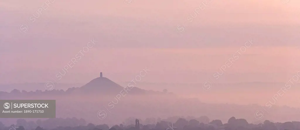 Glastonbury Tor on a misty morning in summer, Somerset, England, United Kingdom, Europe