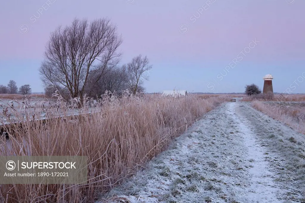 A frosty morning in the Norfolk Broads showing the mill and staithe at West Somerton, Norfolk, England, United Kingdom, Europe