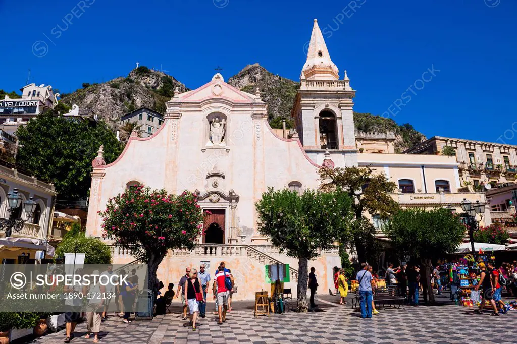 Tourists visiting Church of St. Joseph in Piazza IX Aprile on Corso Umberto, the main street in Taormina, Sicily, Italy, Europe
